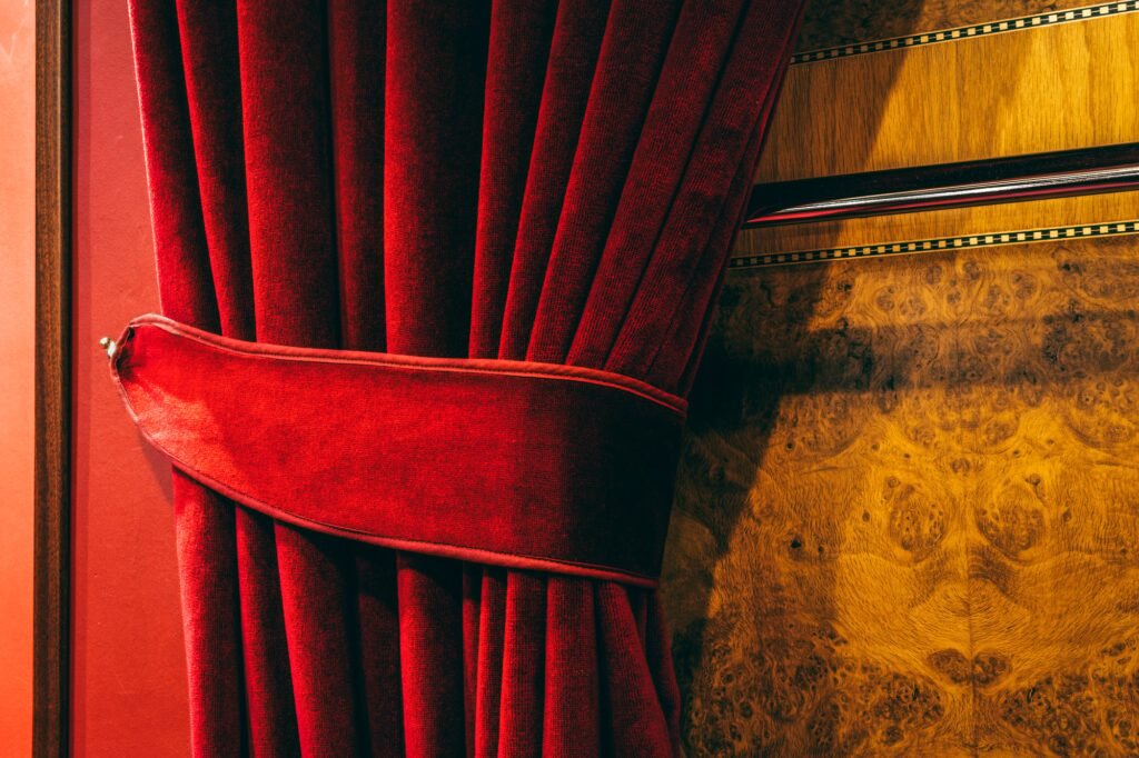 Red velvet curtain of a theater.